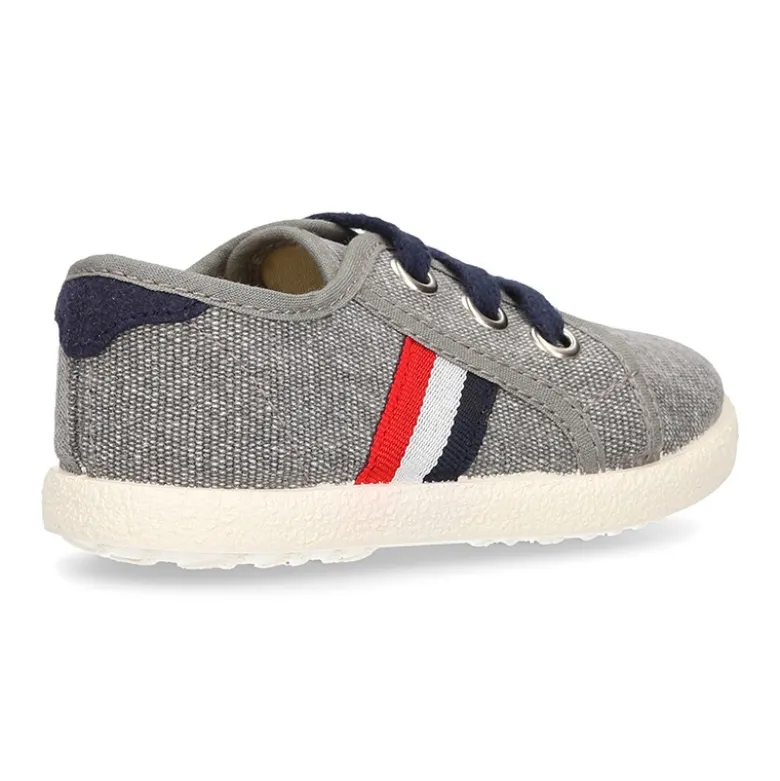 Nuevo Tenis con cordones en lona EFECTO LAVADO con bandera lateral.