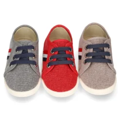 Nuevo Tenis con cordones en lona EFECTO LAVADO con bandera lateral.