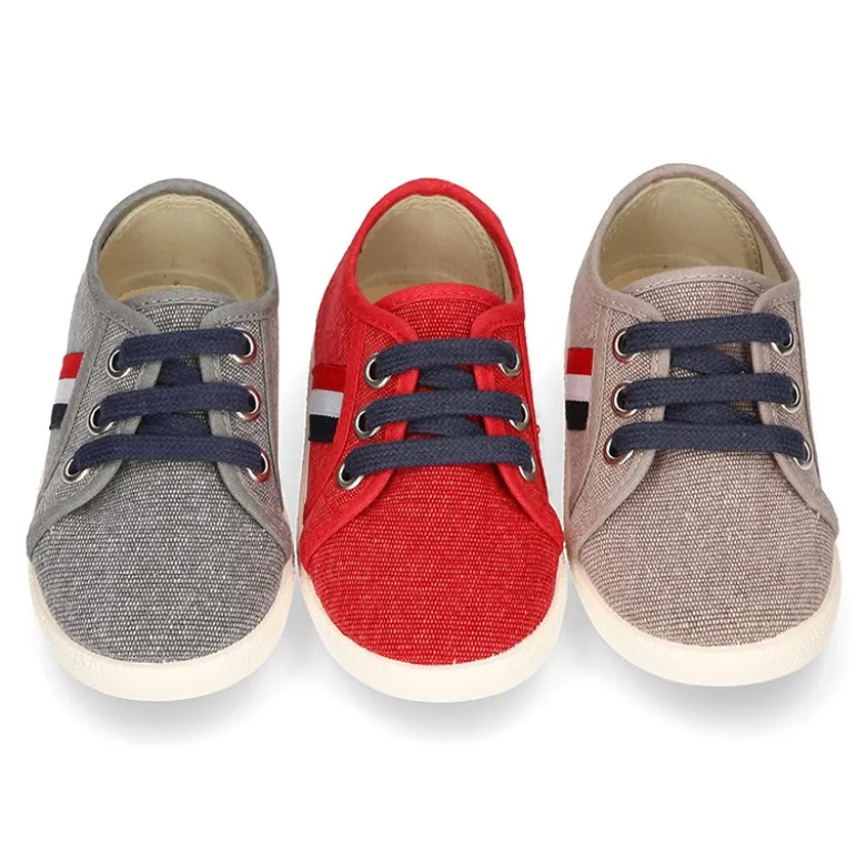 Nuevo Tenis con cordones en lona EFECTO LAVADO con bandera lateral.