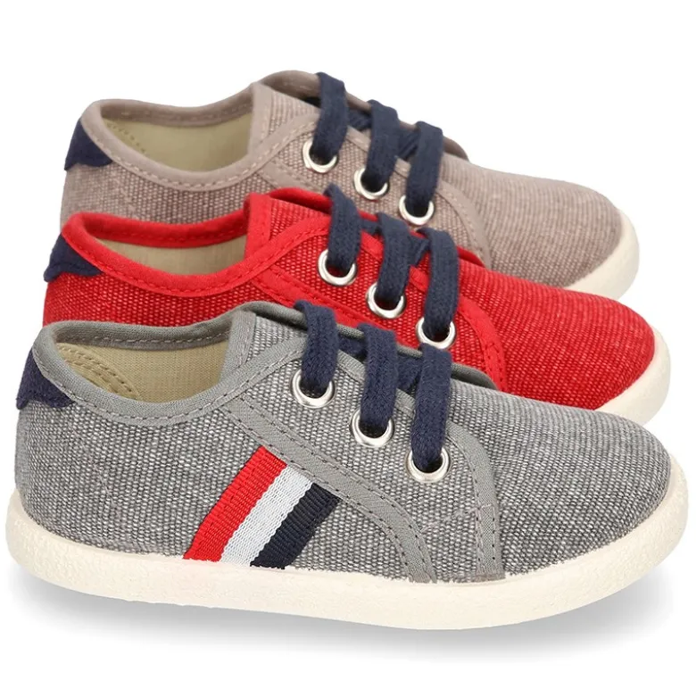 Nuevo Tenis con cordones en lona EFECTO LAVADO con bandera lateral.