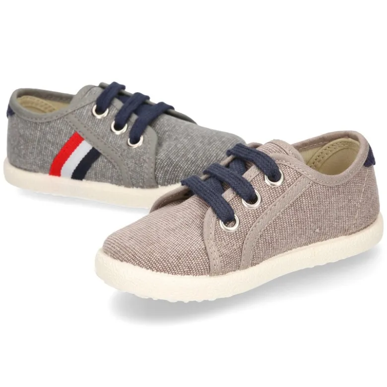 Nuevo Tenis con cordones en lona EFECTO LAVADO con bandera lateral.