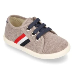 Nuevo Tenis con cordones en lona EFECTO LAVADO con bandera lateral.