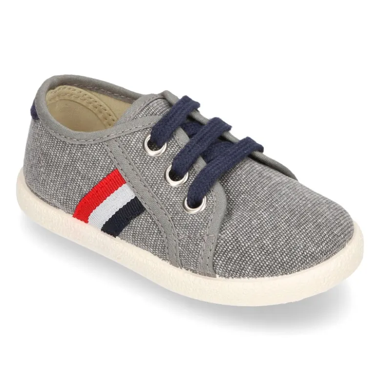 Nuevo Tenis con cordones en lona EFECTO LAVADO con bandera lateral.