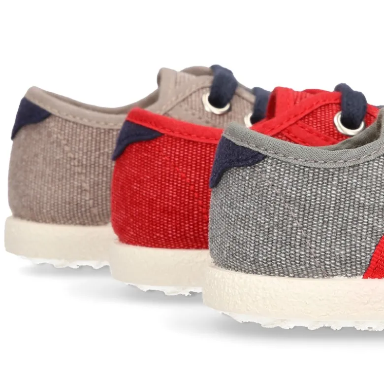 Nuevo Tenis con cordones en lona EFECTO LAVADO con bandera lateral.
