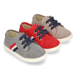 Nuevo Tenis con cordones en lona EFECTO LAVADO con bandera lateral.