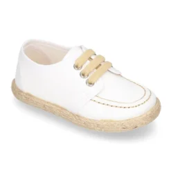 Náutico niño tipo Alpargata en lona con cordones.