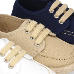 Náutico niño tipo Alpargata en lona con cordones.