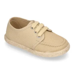 Náutico niño tipo Alpargata en lona con cordones.