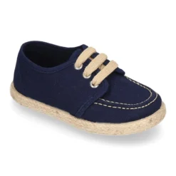 Náutico niño tipo Alpargata en lona con cordones.