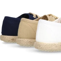 Náutico niño tipo Alpargata en lona con cordones.