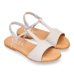 Sandalia Niña en forma de T con elástico en piel serraje.