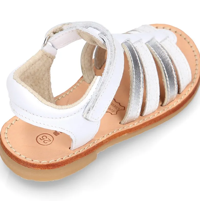 Sandalia niña piel COMBINADA tiras cruzadas con suela super flexible.