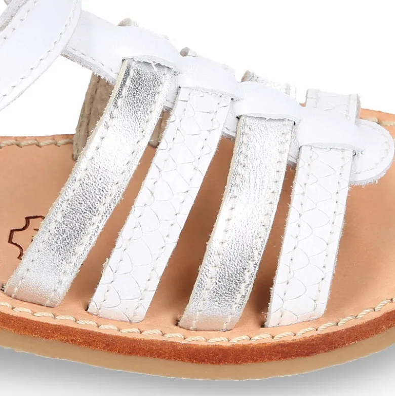 Sandalia niña piel COMBINADA tiras cruzadas con suela super flexible.