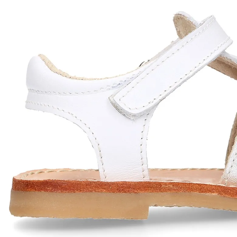 Sandalia niña piel COMBINADA tiras cruzadas con suela super flexible.