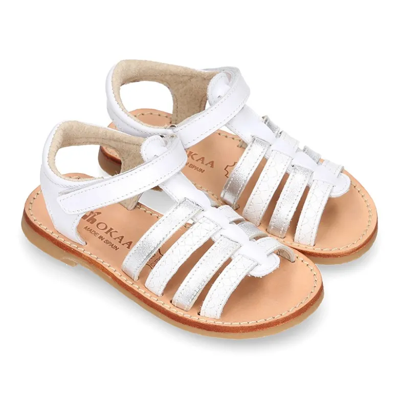 Sandalia niña piel COMBINADA tiras cruzadas con suela super flexible.