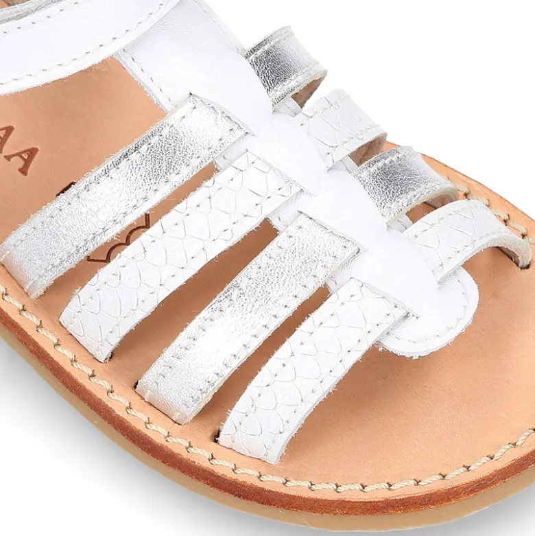 Sandalia niña piel COMBINADA tiras cruzadas con suela super flexible.