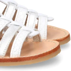 Sandalia niña piel COMBINADA tiras cruzadas con suela super flexible.