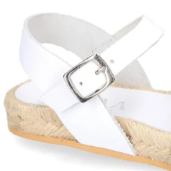 Sandalias niña tipo alpargata con tiras en piel.