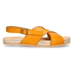 Sandalias tipo alpargata con tiras cruzadas en piel.