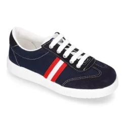 Tenis niño combinado en lona y serraje con cordones.