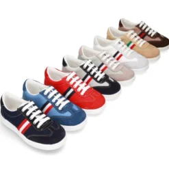 Tenis niño combinado en lona y serraje con cordones.