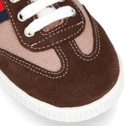 Tenis niño combinado en lona y serraje con cordones.