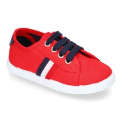Tenis niño con cordones en lona con bandera.