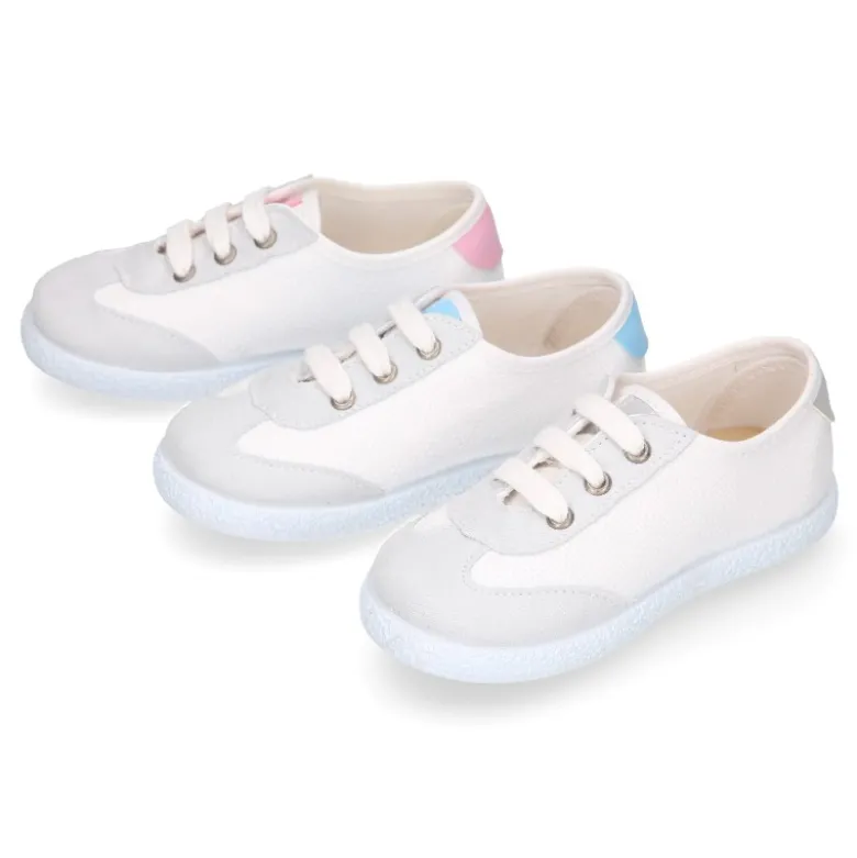 Tenis niños combinado en lona algodón y cordones.