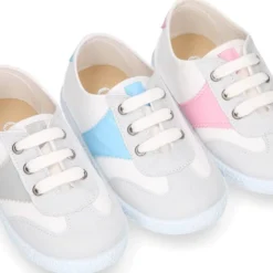 Tenis niños combinado en lona algodón y cordones.