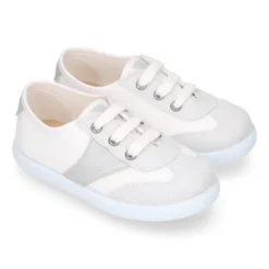 Tenis niños combinado en lona algodón y cordones.