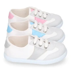 Tenis niños combinado en lona algodón y cordones.