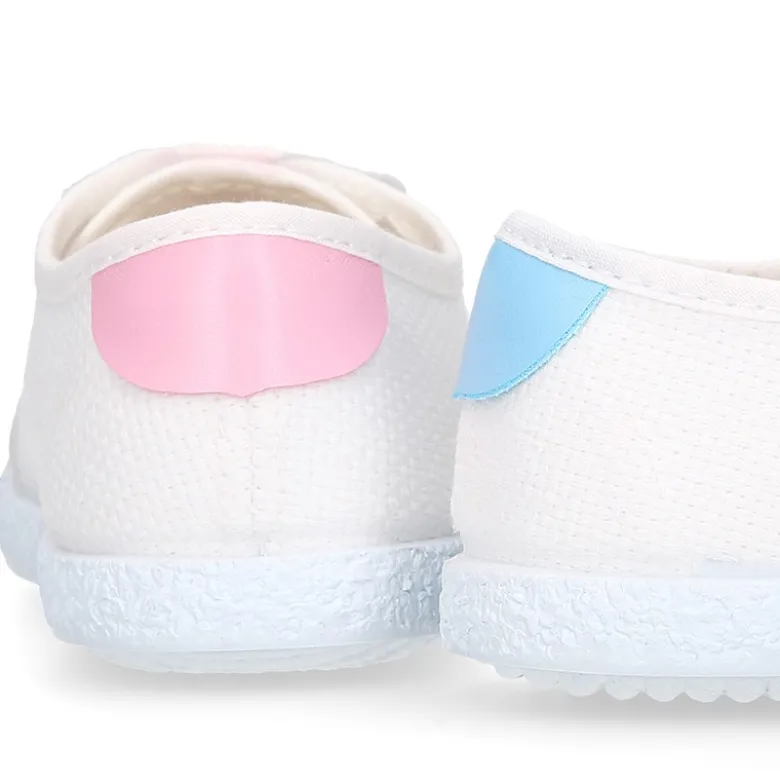 Tenis niños combinado en lona algodón y cordones.