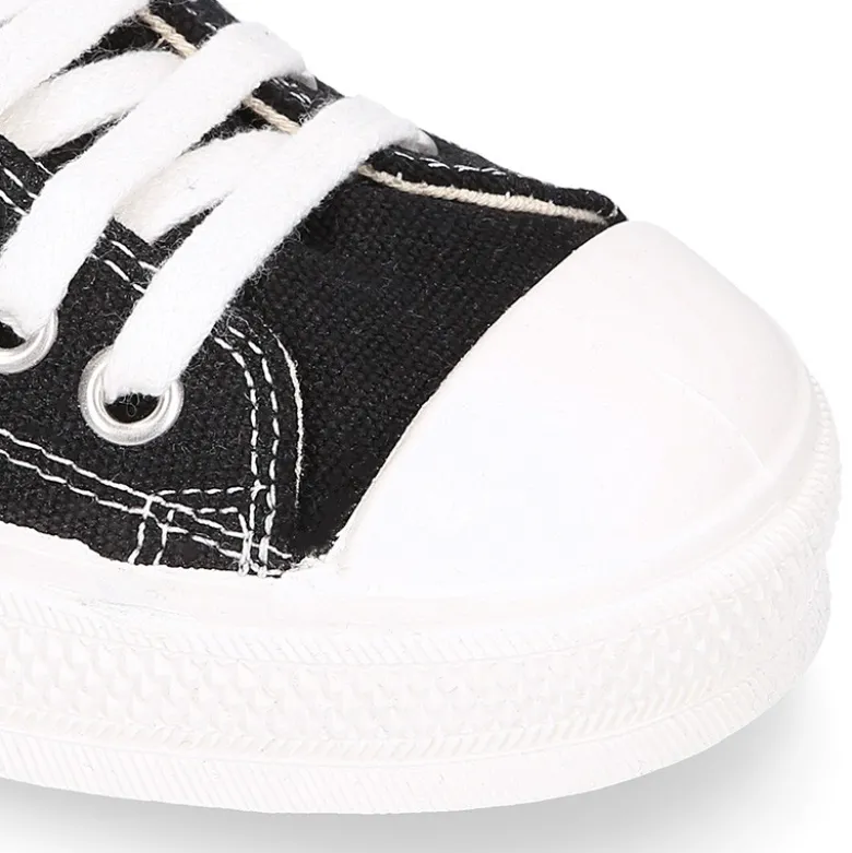 Zapatilla alta niños CASUAL con puntera y cordones en color NEGRO.