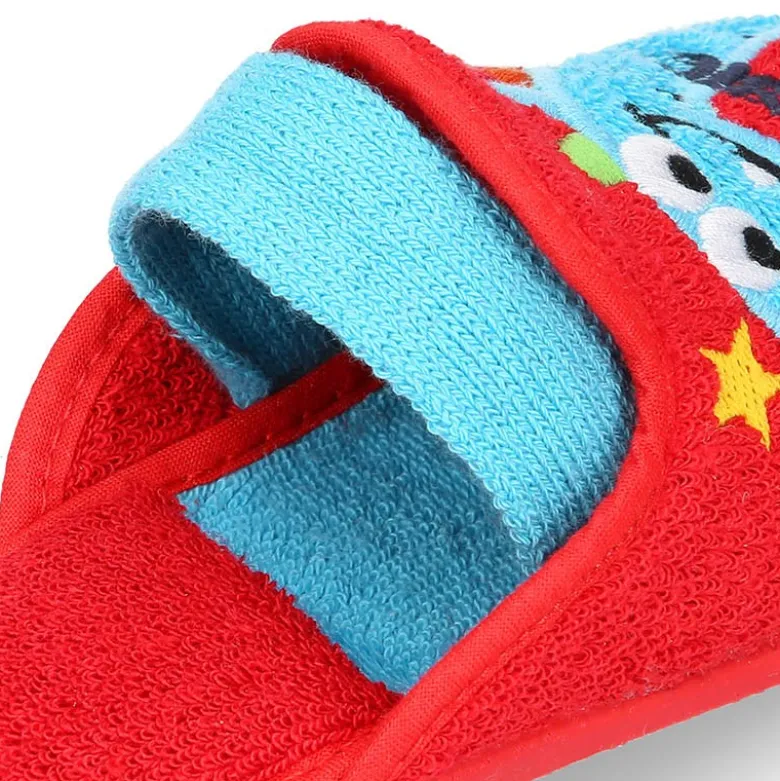 Zapatilla casa niños DINOSAURIO con elástico en toalla.