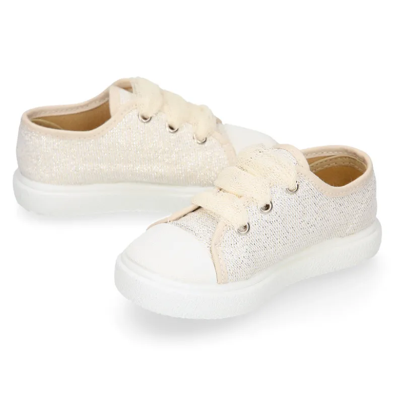 Zapatilla niña ceremonia con cordones en tul en lona con brillos.