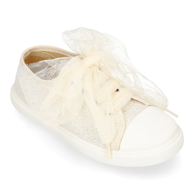 Zapatilla niña ceremonia con cordones en tul en lona con brillos.