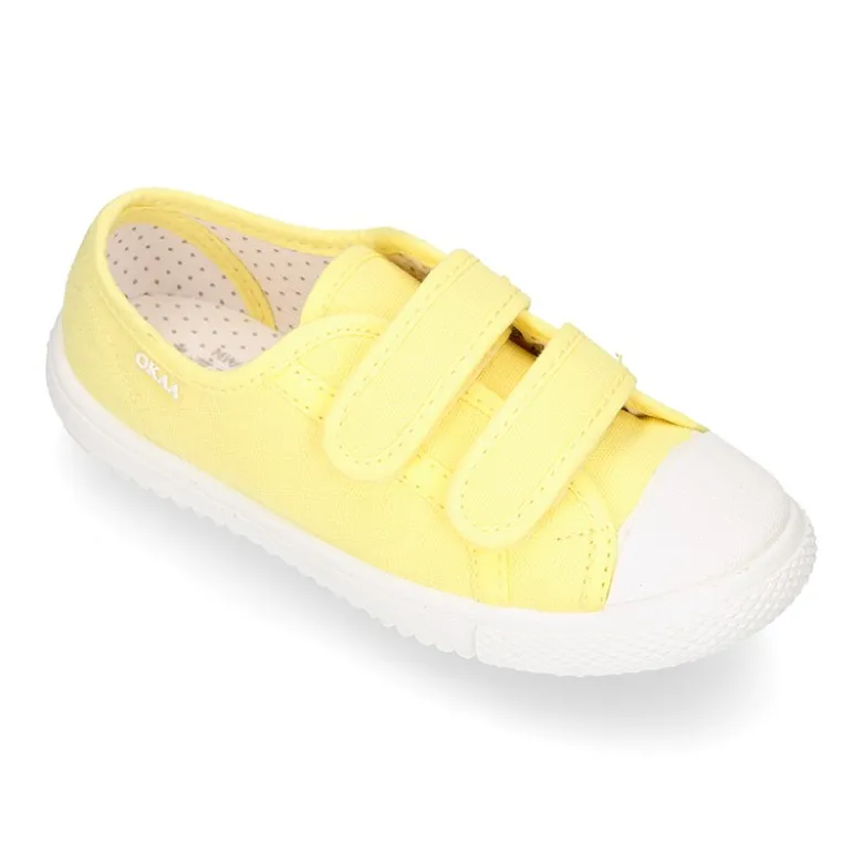Zapatilla niña OKAA sin cordones y puntera en lona piqué algodón.