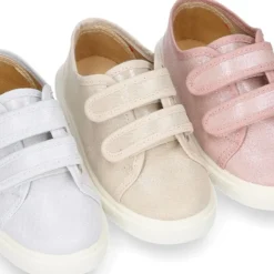 Zapatilla niña sin cordones en lona METALIZADA.