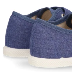 Zapatilla niño con puntera y sin cordones en lona piqué algodón en color JEANS.