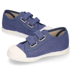 Zapatilla niño con puntera y sin cordones en lona piqué algodón en color JEANS.