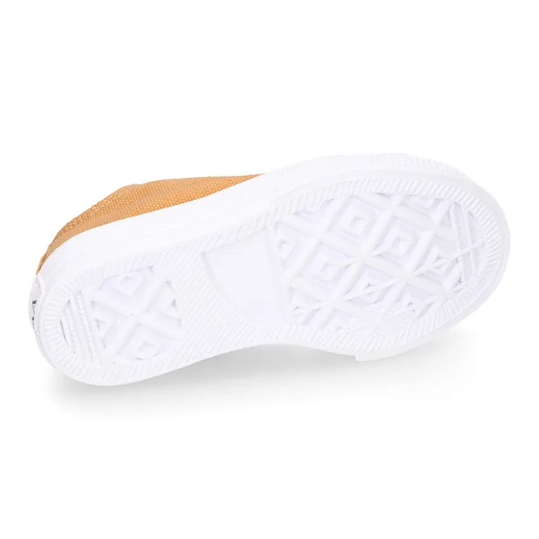 Zapatilla niños CASUAL OKAA con puntera y cordones en color CUERO.