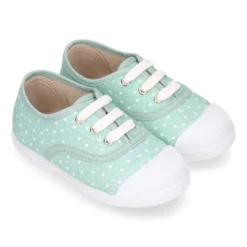 Zapatilla niños con cordones y puntera en lona con ESTRELLAS.