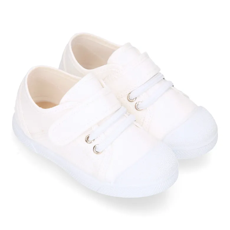 Zapatilla niños con puntera y cordones elásticos en lona algodón.