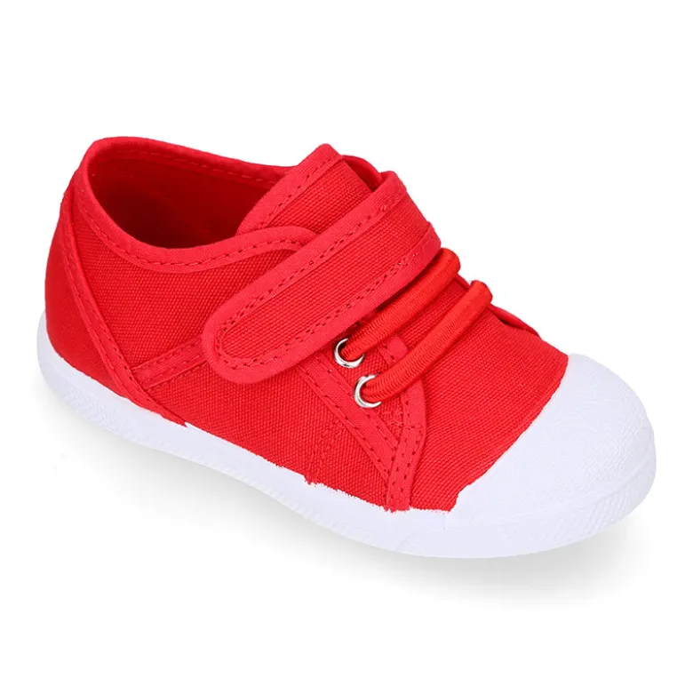 Zapatilla niños con puntera y cordones elásticos en lona algodón.