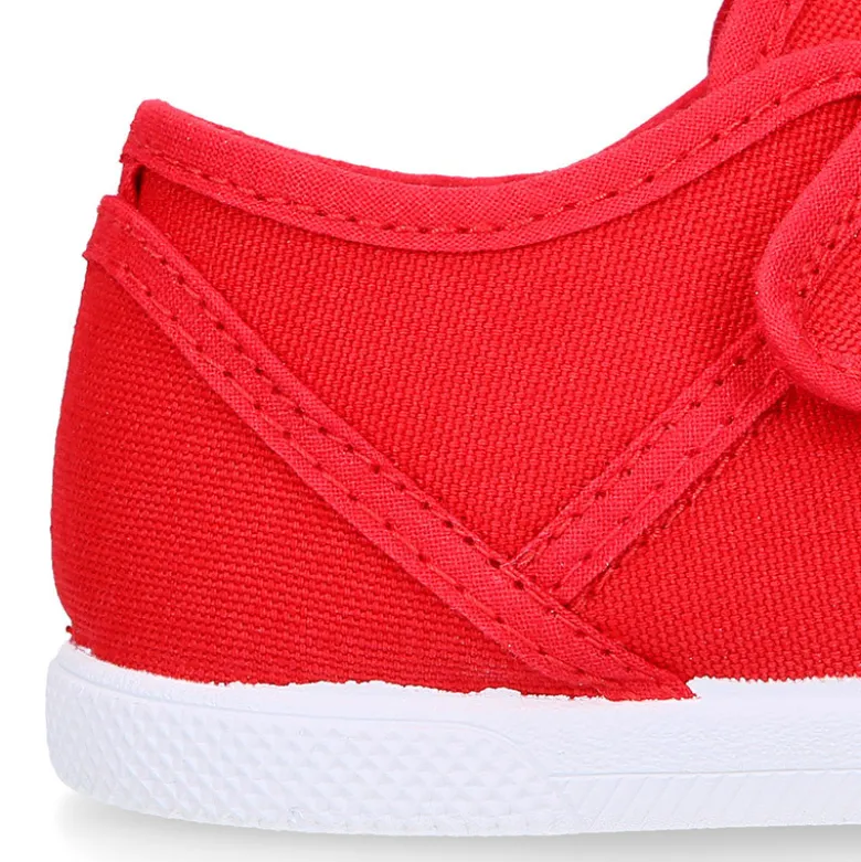 Zapatilla niños con puntera y cordones elásticos en lona algodón.