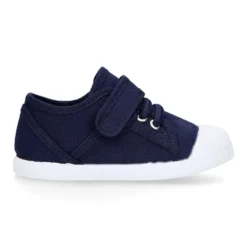 Zapatilla niños con puntera y cordones elásticos en lona algodón.