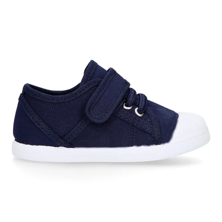 Zapatilla niños con puntera y cordones elásticos en lona algodón.