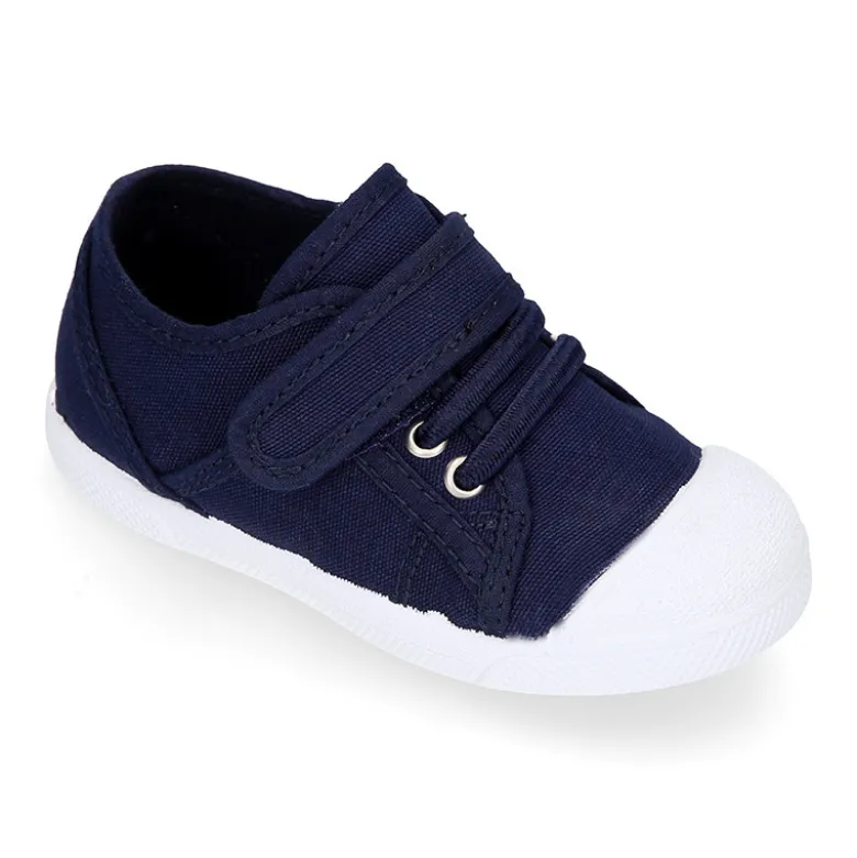Zapatilla niños con puntera y cordones elásticos en lona algodón.