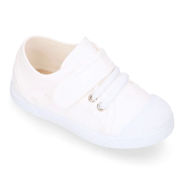 Zapatilla niños con puntera y cordones elásticos en lona algodón.