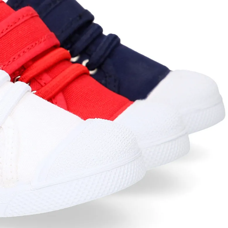Zapatilla niños con puntera y cordones elásticos en lona algodón.